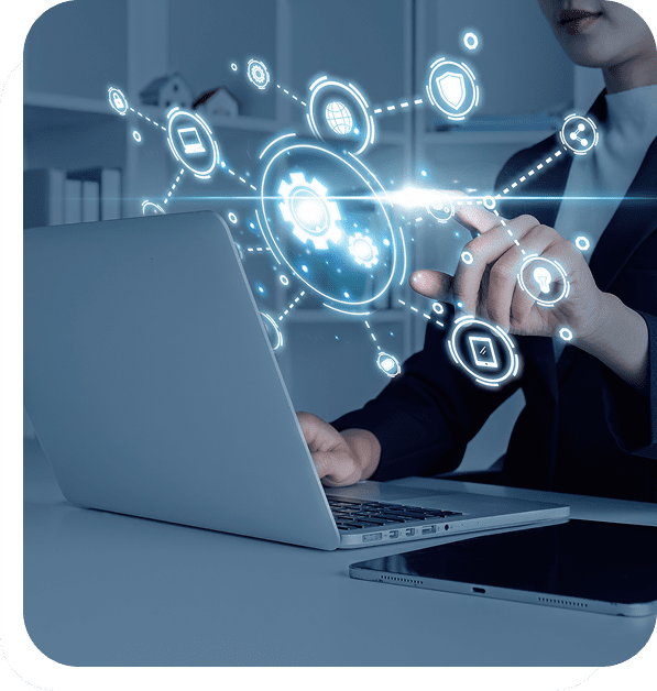 Person using laptop with digital interface hologram.